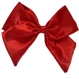 A red satin hair bow clip for women displayed on a white background.