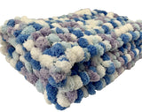 Blue pram blanket.
