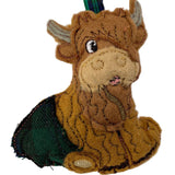 Highland cow machine embroidered felt Christmas Decoration in navy  tartan kilt.