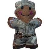 Soldier felt gingerbread decoration. Dressed in cotton fabric camo embroidered uniform. With faux leather brown boots, cap and sidearm in faux leather holster.
