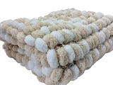Knitted baby blanket.