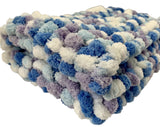 Chunky knit baby blanket.