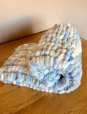 Chunky knit baby blanket.