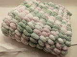 Chunky knit baby blanket.