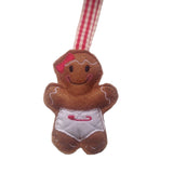 Baby girl felt gingerbread decoration dressed in a cotton fabric nappy. Lightly filled to create depth and character. Hand finished.