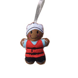 A Yachtsman gingerbread decoration, wearing a red life jacket and a cap, designed as a Christmas tree ornament.