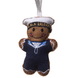 custom made sailor gingerbread decoration on white background.