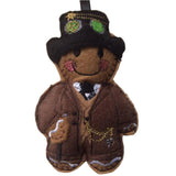 Gingerbread man in Steampunk outfit on white background.
