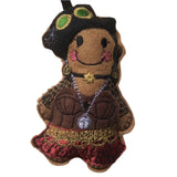 Steam punk gingerbread female character with a black hat and colorful outfit on a white backgroundi.