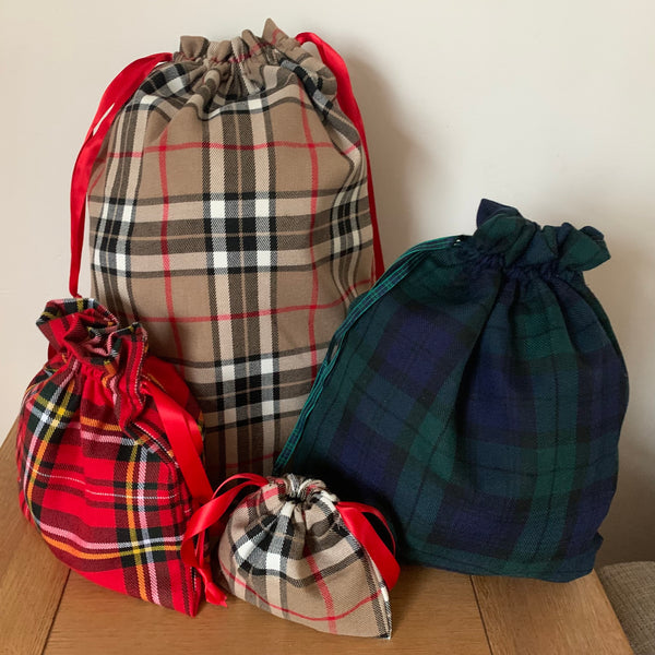 Fabric gift, storage or travel bags in navy red or beige tartan fabric. sold separately 4 sizes available.