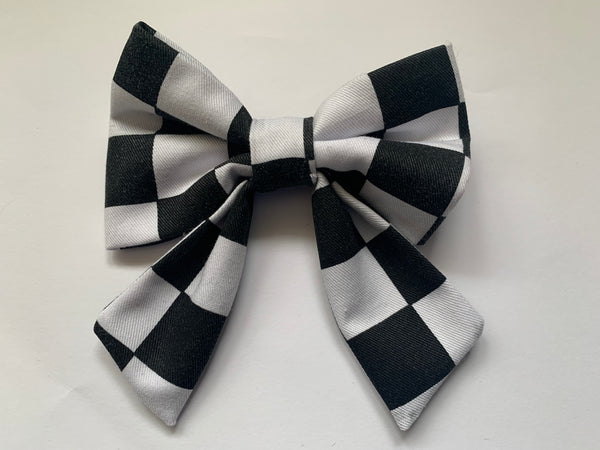 Black and white check fabric sailor dog bow tie. slip on collar design.