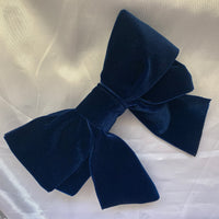 Navy velvet hair bow clip for women.