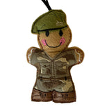 POW Yorkshire Regiment soldier gingerbread decoration, wearing a green beret and camouflage uniform on a white background.