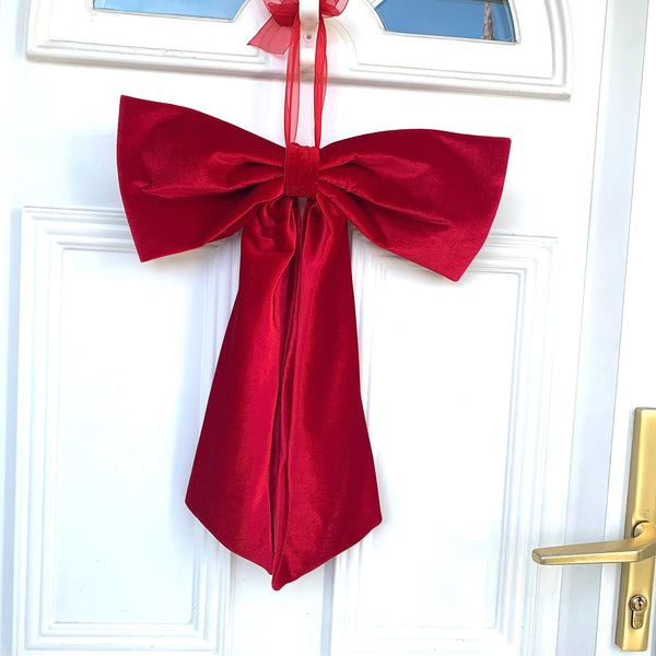 Christmas door bow in red velvet.