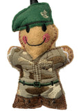 A handmade embroidered felt soldier ornament wearing a green beret, camouflage uniform, and brown boots, shown against a plain white background.