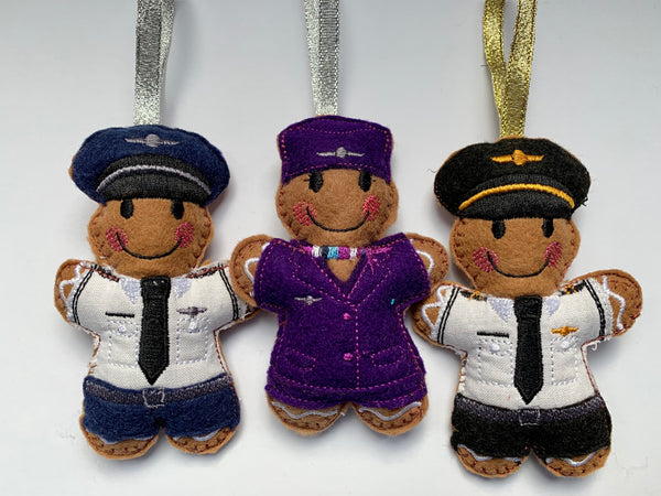 Airline pilot and cabin crew felt gingerbread man decorations.
