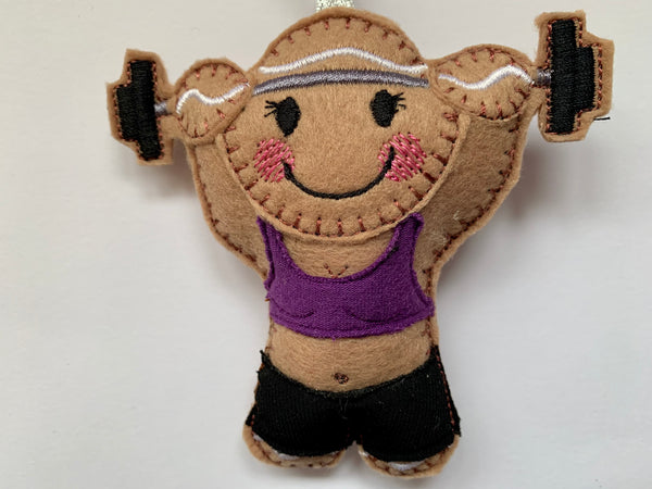 Weightlifting girl felt gingerbread decoration.