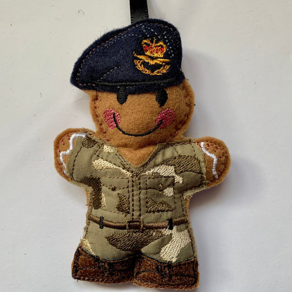 RAF regiment officer, gingerbread man decoration, in camouflage uniform with navy beret and badge.