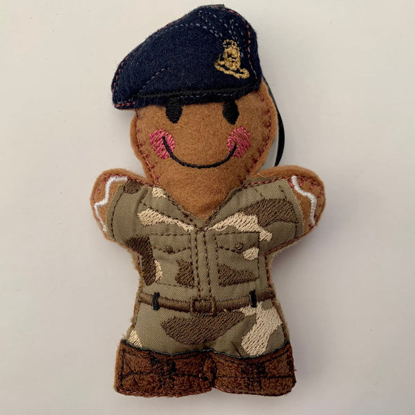 Royal artillery regiment felt gingerbread man ornament.
