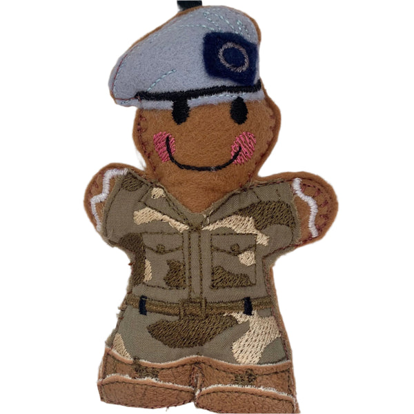 Army Air Corps felt gingerbread soldier decoration. Blue beret, brown faux leather boots and embroidered fabric camouflage uniform.