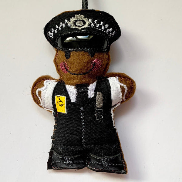 London Metropolitan police officer. Felt gingerbread man Christmas tree decoration. 