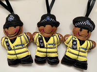 British Transport Police Officer felt gingerbread decorations. Available with cap, helmet or female officer.