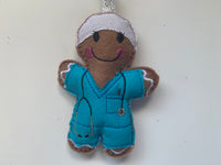 Doctor Gingerbread man in Turquoise Scrubs