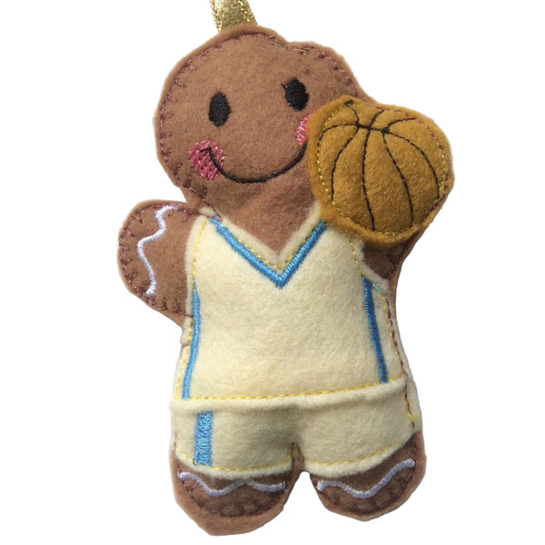 Basketball player, felt gingerbread man decoration. Lightly filled with a polyester stuffing to create depth and character. Hand sewn to finish.