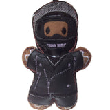 Biker gingerbread man Christmas decoration. Dressed in faux leather jacket and trousers., with glossy black full face helmet. On white background.