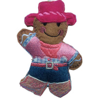 Cowgirl, felt gingerbread Christmas decoration on white background.