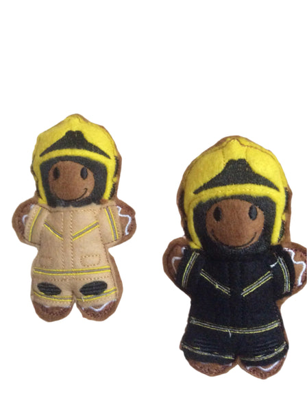 Firefighter gingerbread man decoration. Black or beige uniform with yellow helmet. on white background.