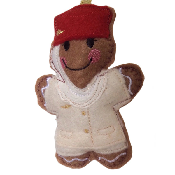 Flight attendant machine embroidered felt gingerbread Christmas tree decoration. Cream and red uniform