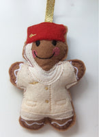 Flight Attendant Cream and Red Uniform Gingerbread Man Decoration