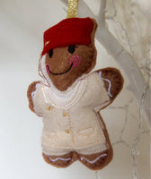 Flight Attendant Cream and Red Uniform Gingerbread Man Decoration