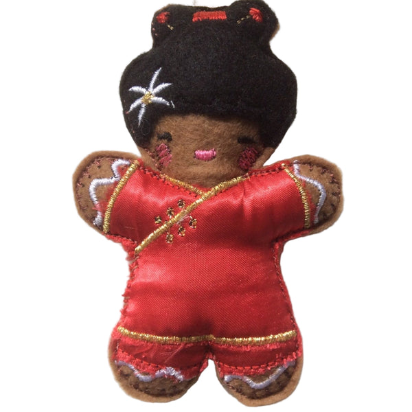 Chinese girl in red satin traditional outfit. This gingerbread decoration is designed for hanging from a Christmas tree.