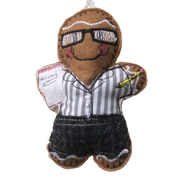 Gingerbread novelty character with a businesswoman theme, wearing a striped shirt and glasses, made from felt.