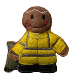 Bin man gingerbread man character with a yellow jacket,  black boots and green wheelie bin.
