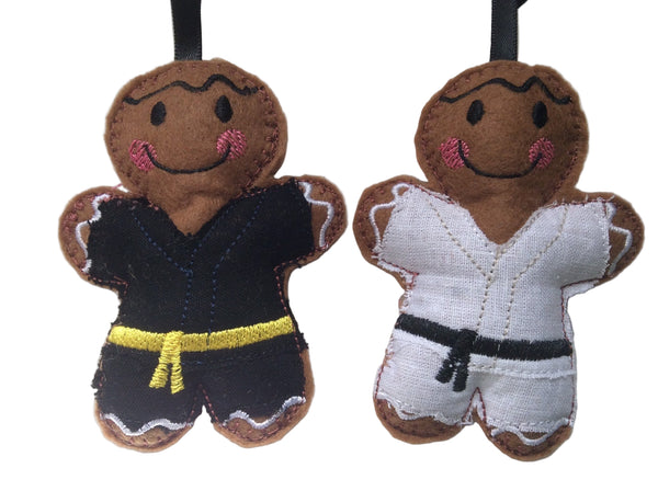 Martial arts machine embroidered gingerbread decoration. Available in either black or white dogi