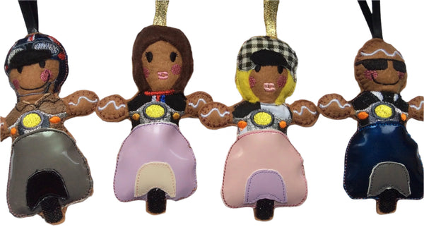 Mod gingerbread decorations on white background.
