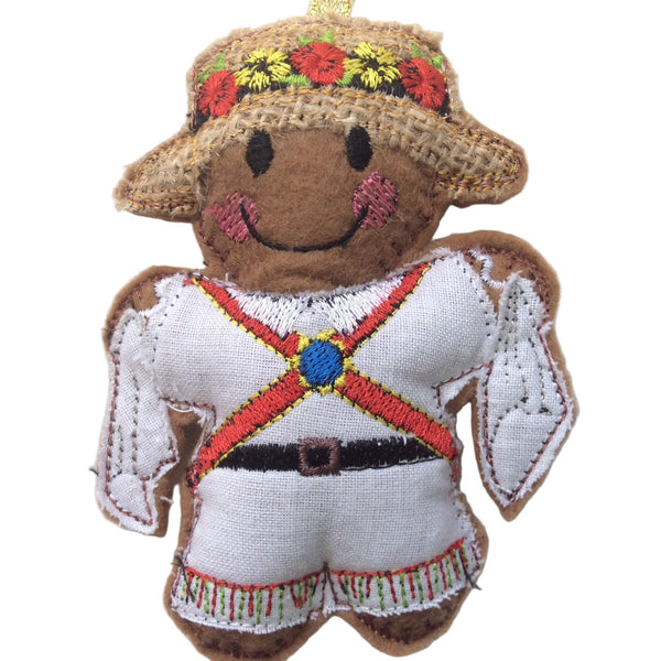 Morris Dancer gingerbread man decoration. In white outfit with hat that has been embroidered with flowers.