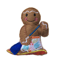 Paddleboarding boy gingerbread man decoration.