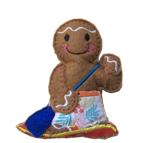Paddleboarding boy gingerbread man decoration.