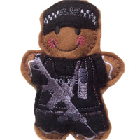 Armed police officer felt gingerbread decoration.