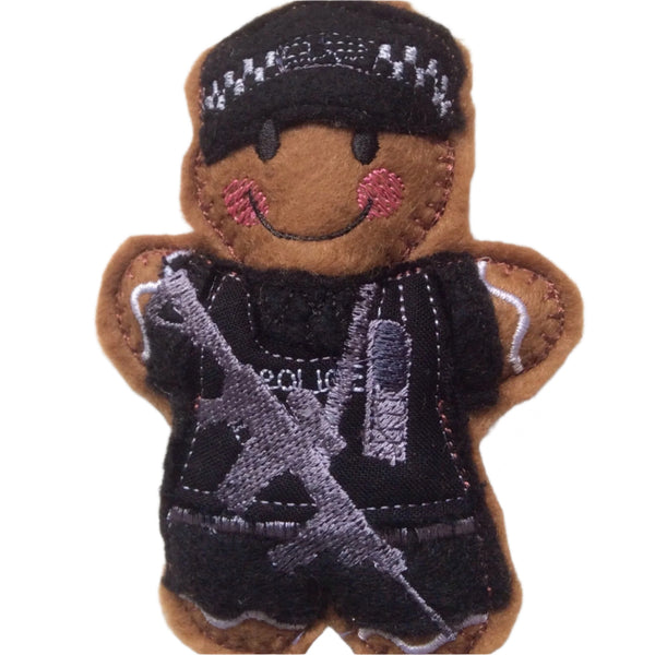 Armed police officer felt gingerbread decoration.