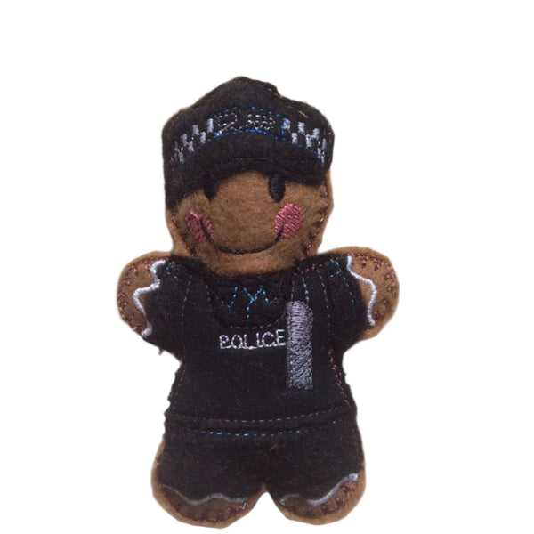 police officer gingerbread decoration in black uniform, cap and vest, on a white background