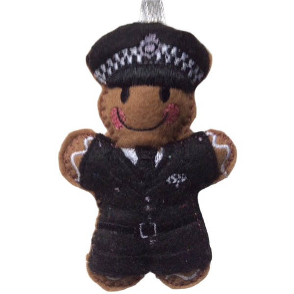 Decorative gingerbread man decoration wearing a police uniform on a white background
