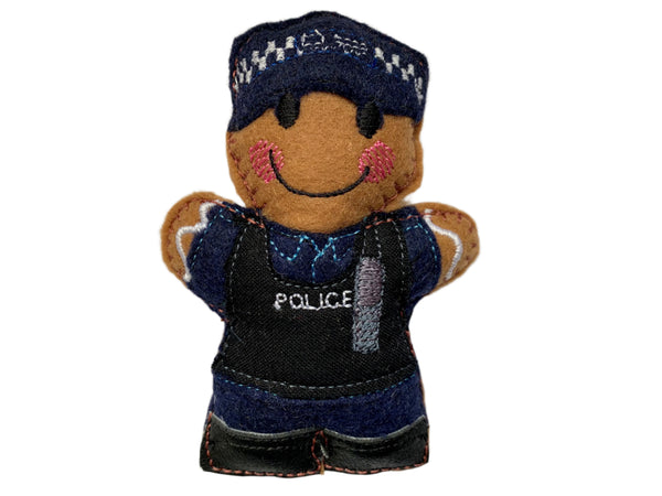 Police officer igingerbread decoration in navy blue uniform with stab vest, on white background.