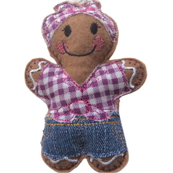 Rock and roll girl gingerbread decoration with a smiling face, wearing a checkered shirt and headscarf and blue denim jeans. on white background.