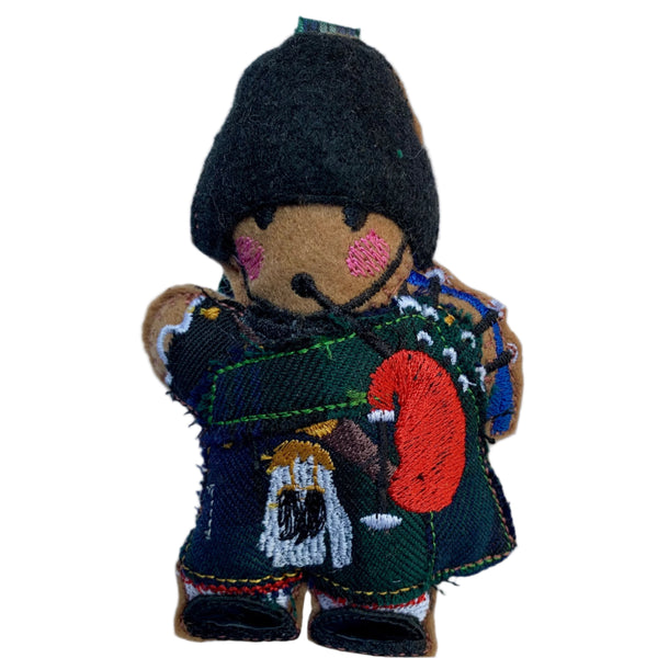 Scottish Piper In Bearskin Hat, Gingerbread Man Decoration.