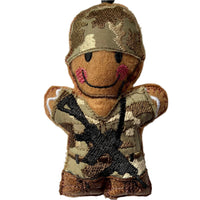 Gingerbread soldier felt decoration with gun and helmet.